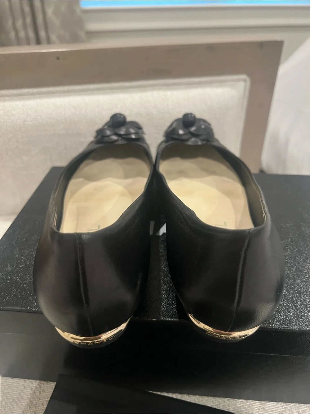 CHANEL Black Leather Camellia Round-Toe Flats